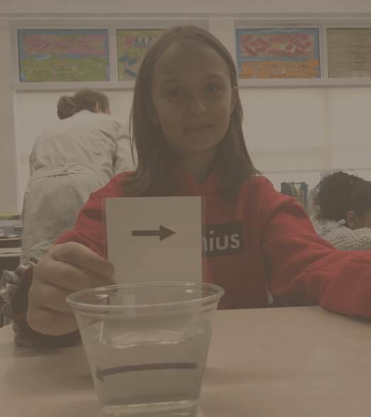 girl doing experiment with water